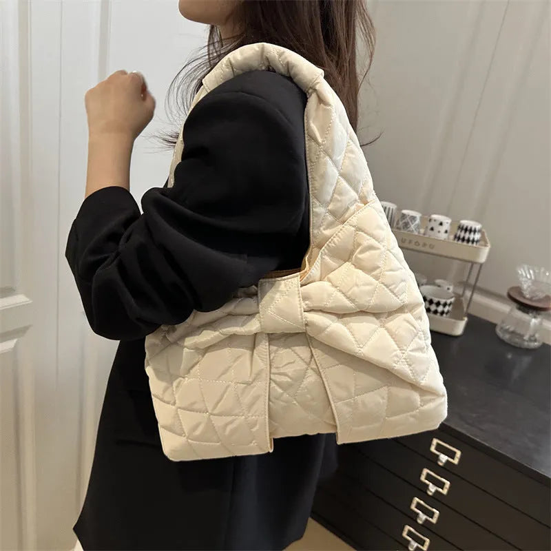 Women's one shoulder handbag in cotton with polyester lining, soft horizontal square shape, zipper change bag, shown in white black khaki pink
