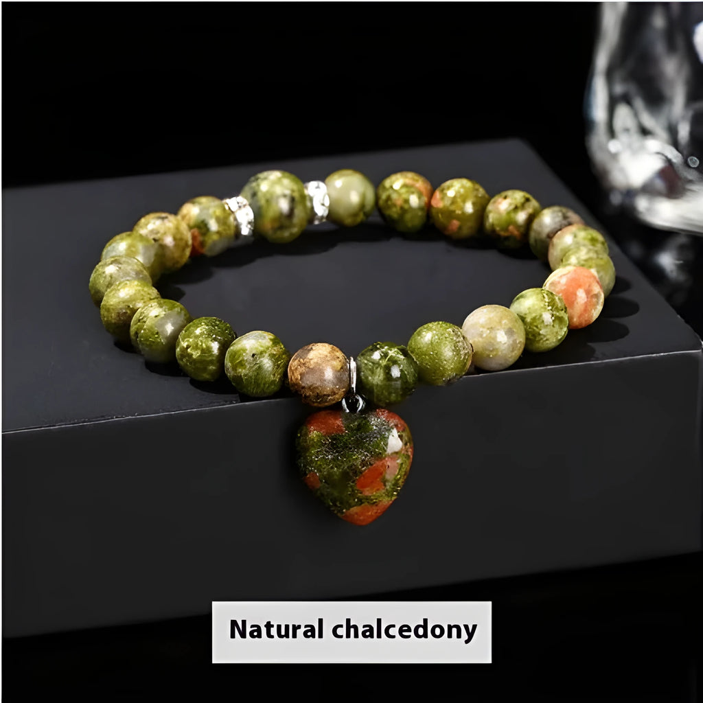 Handmade women's bracelet with geometric pendant and round natural crystal beads.
