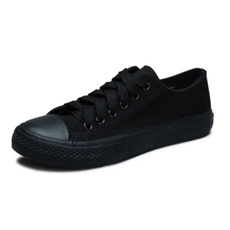 Women's canvas casual shoes in solid colours showing black, white black, white red, and all black options