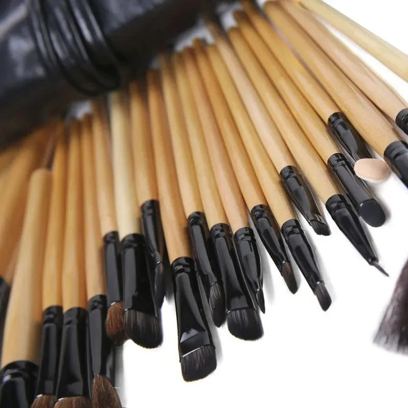 24 professional makeup brushes with wooden handles in a PU gift bag including eyebrow, powder and eyeshadow tools