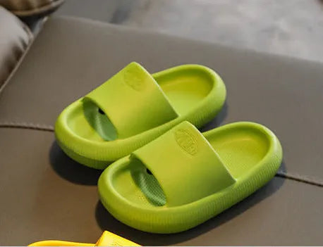 Mixed colour children's EVA slippers with non-slip sole, sizes 22-35, for home use.