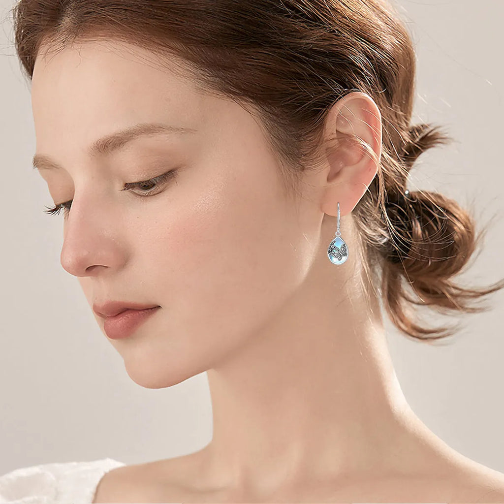 925 sterling silver butterfly moonstone leverback earrings for women, silver colour, on display