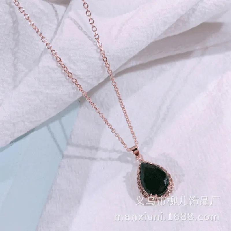 Geometric rhinestone water drop necklace in rose gold electroplated finish