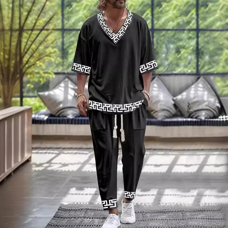 A thin polyester trousers suit with a V-neck jacket featuring cropped sleeves, shown alongside the matching trousers.