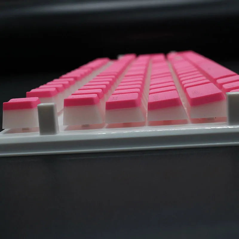 PBT pudding keycap set with translucent sides showing RGB lighting through 108 keys including UK ISO layout