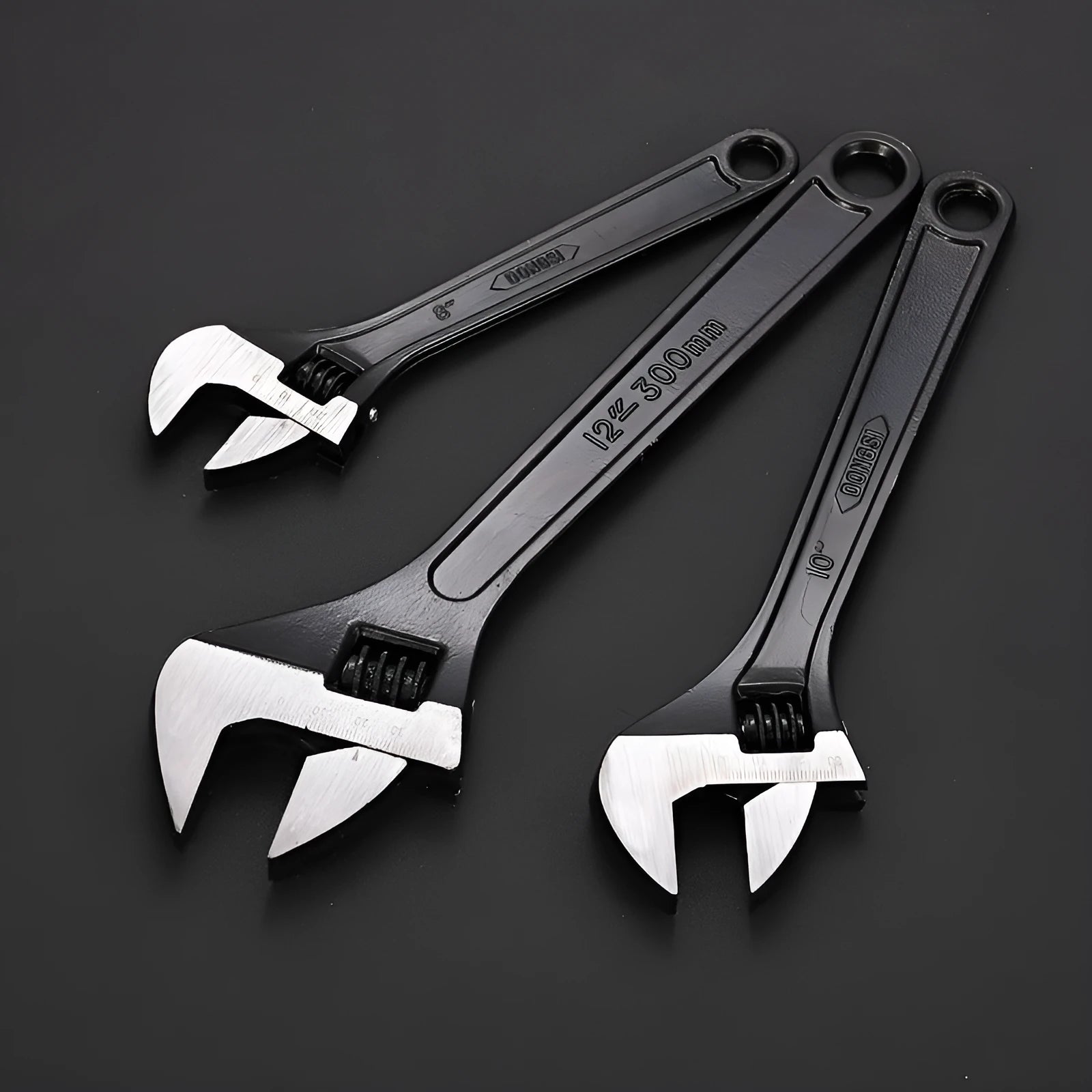 10-inch black high carbon steel adjustable open-end wrench on a workbench