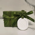 Car aromatherapy fragrant stone pendant and 10ml essential oil bottle in a gift box set.