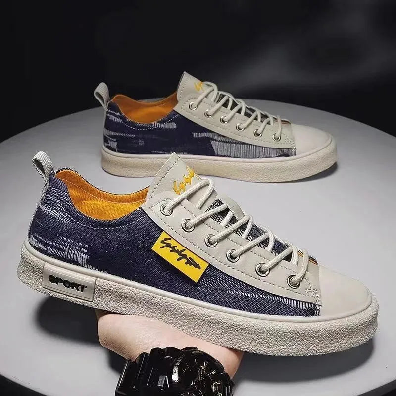 Men's canvas casual shoes in dark blue with front lace-up closure and rubber sole