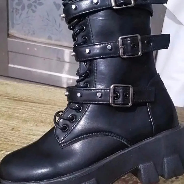 Women's black mid-calf knight boots with a metal buckle and side zip fastening