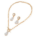 Gold-colour Retro Baroque pearl pendant necklace and matching stud earrings set on a white background.