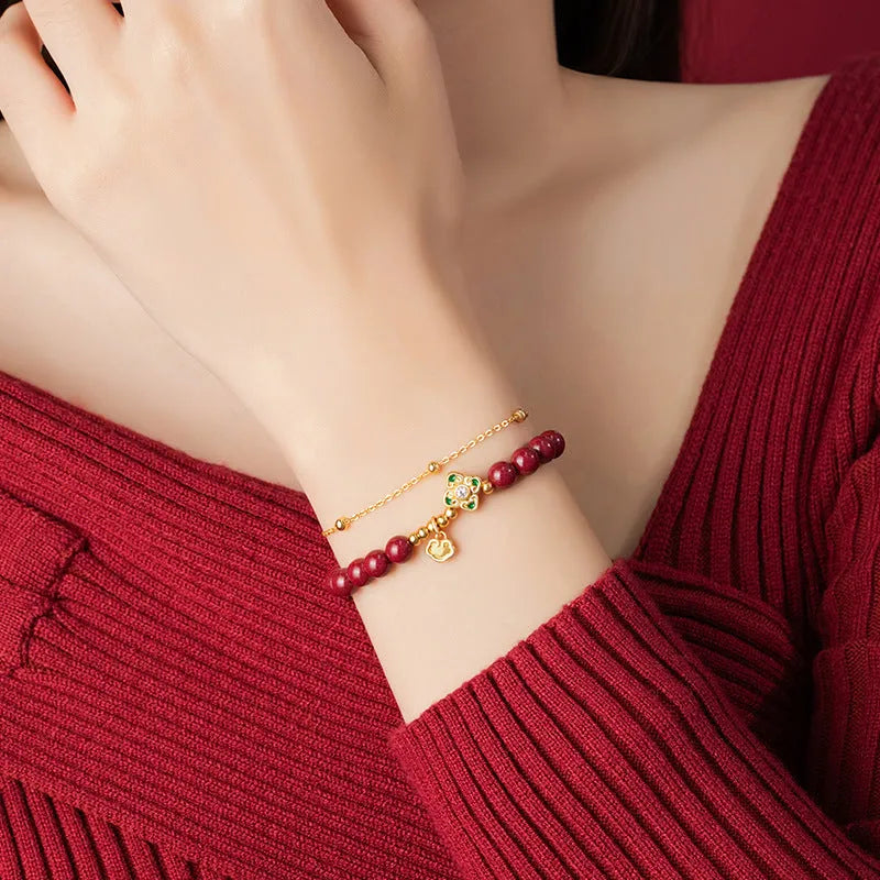 Sterling silver women's bracelet with geometric design featuring Ruyi, Xiangyun motifs and cinnabar flower detail.