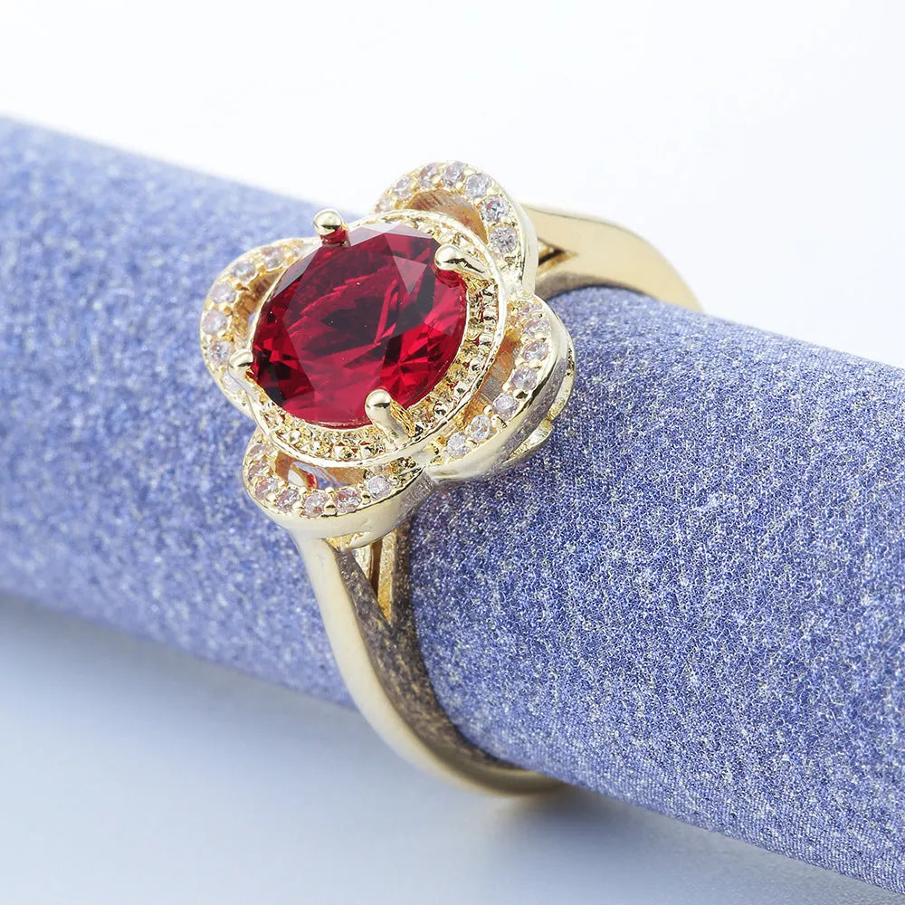 Copper zircon ring with a fruit-shaped design, shown in colour 10-6-1395.