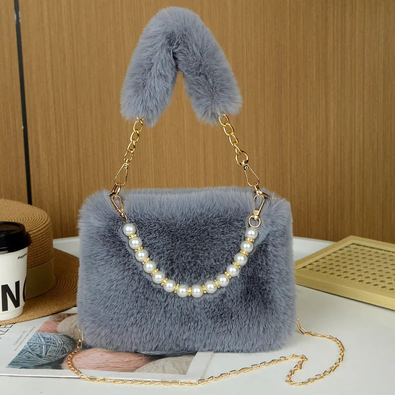 Plush crossbody bag with chain strap in horizontal square shape, synthetic leather lining, seven colours available