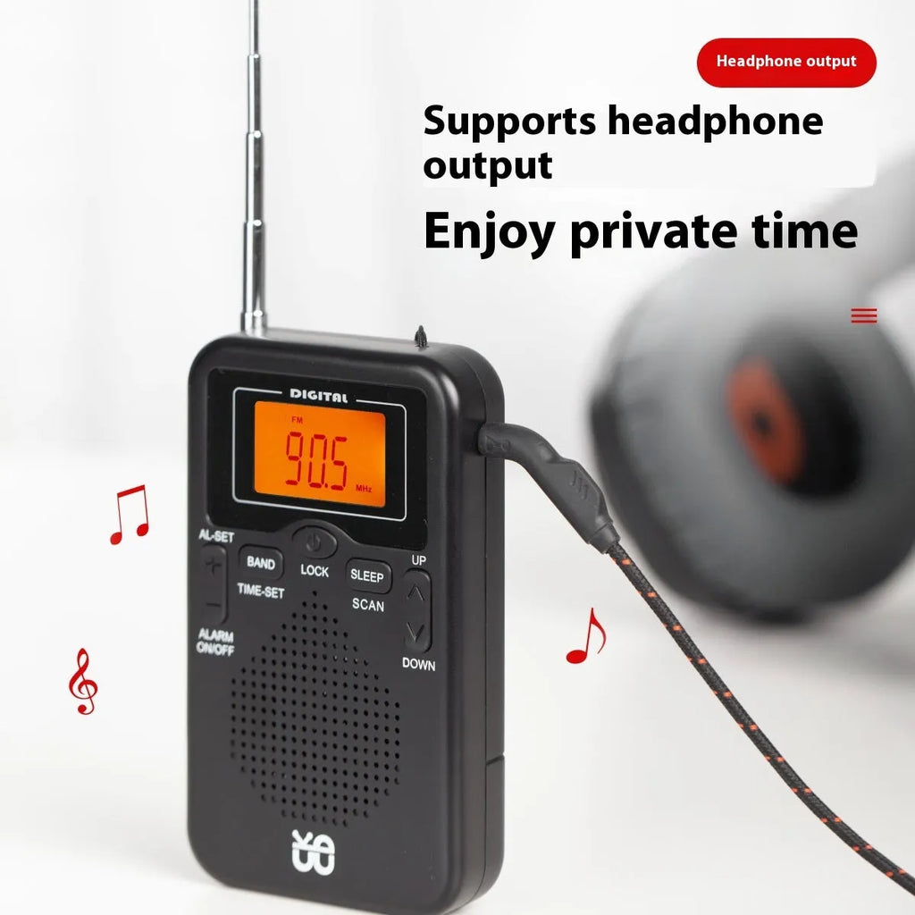 Portable pocket FM AM clock control stereo radio W-206 Black with digital display and built-in speaker on white background