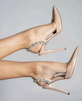 Women's black patent leather rhinestone pointed toe high heel sandals on a white background.