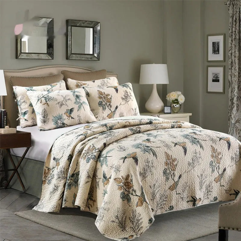 Quilted pure cotton bed cover set with printed pattern on bed, includes two pillowcases.