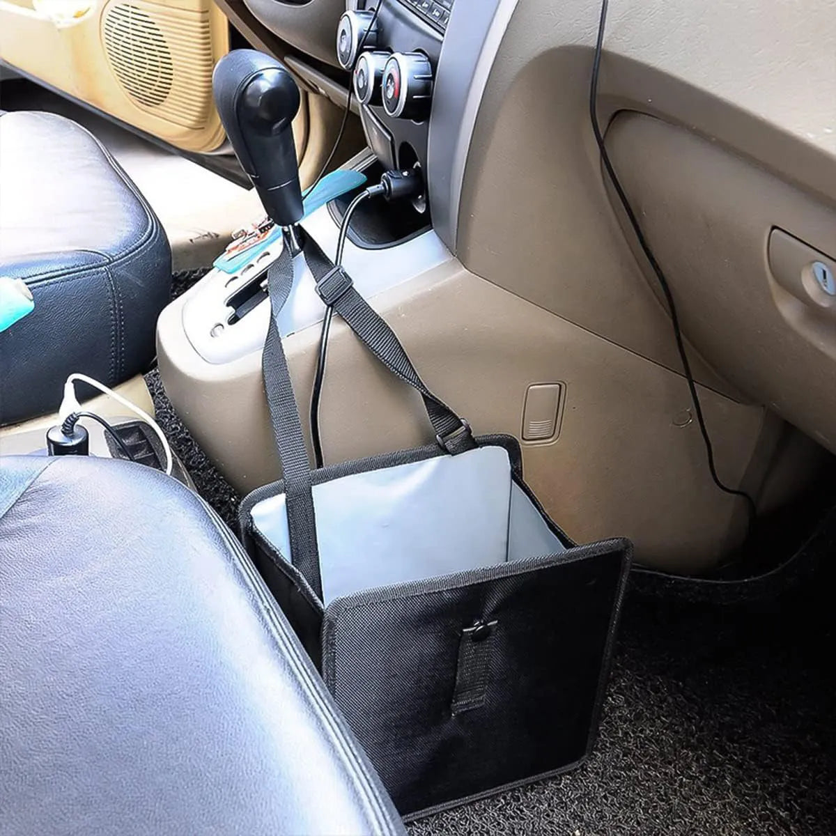 Black car hanging trash can with handle, made from Oxford cloth, shown folded and open