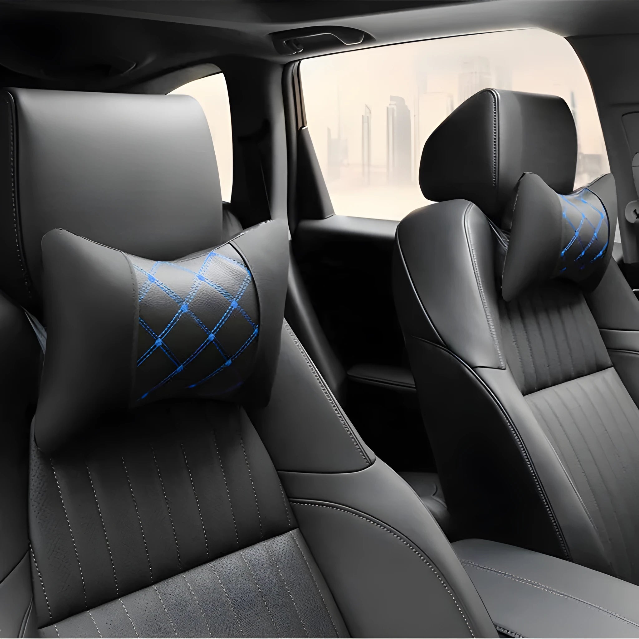 Black quilted artificial leather car headrest pillow with diamond stitching, shown on a car seat.