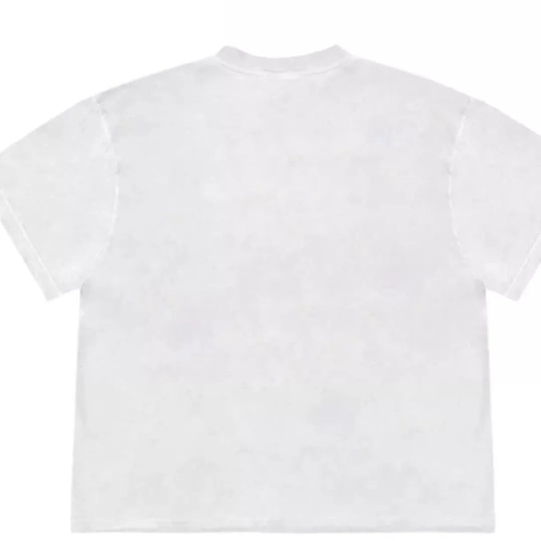 A loose-fitting blueberry and floral patchwork short sleeve t-shirt on a hanger.
