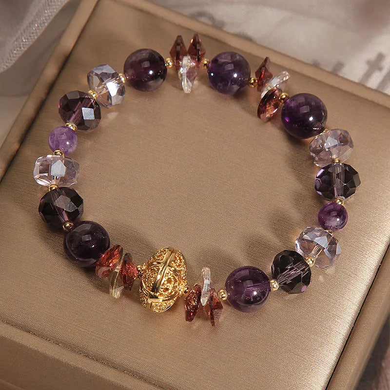 Purple crystal pumpkin beads bracelet for women with wind chime charms and rhinestone details