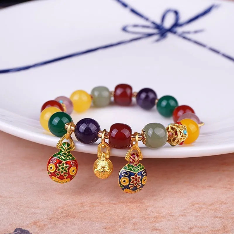 Swallowing Gold Beast agate bracelet with 10mm beads and hand-woven construction