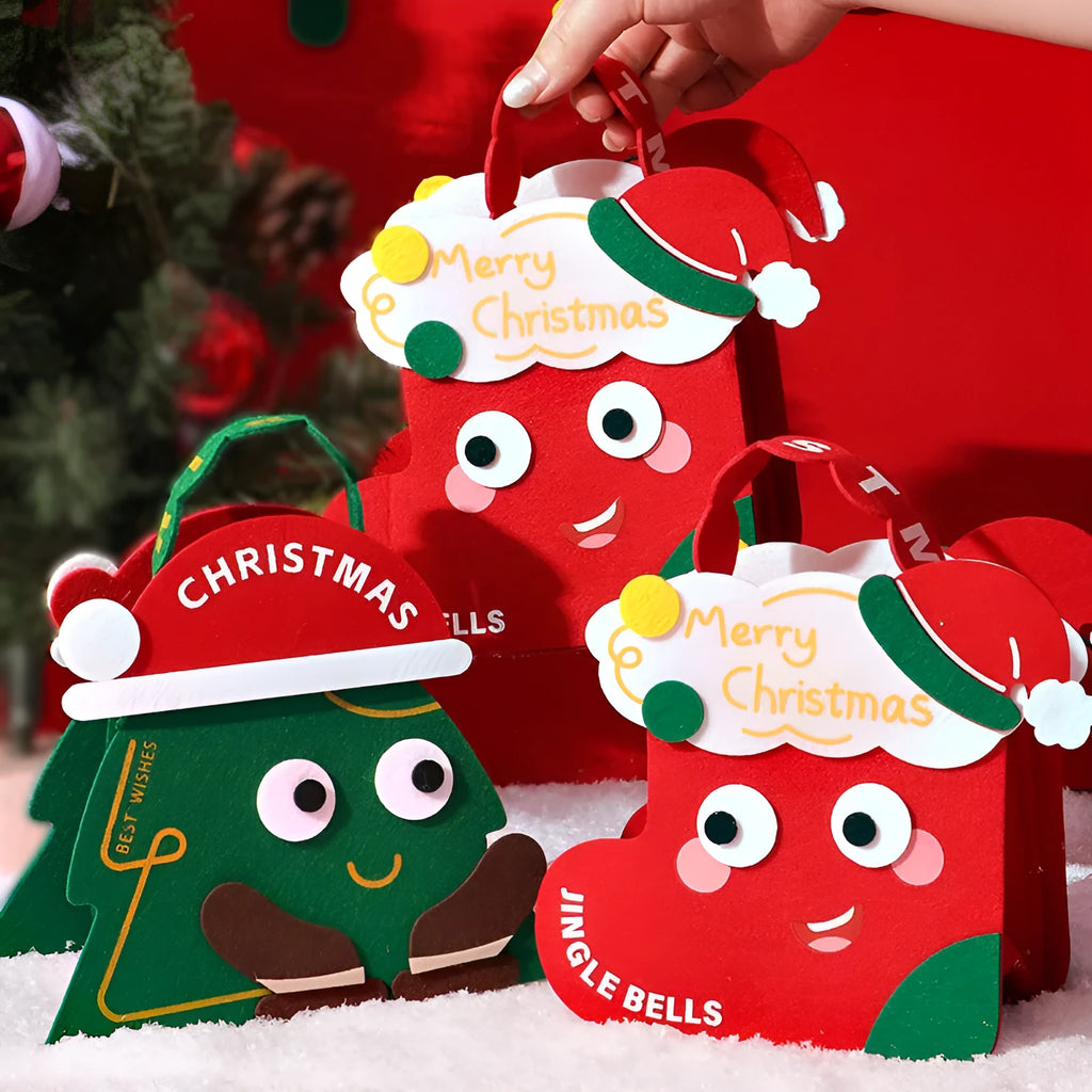 Green felt gift bag with cartoon Christmas design on a white background
