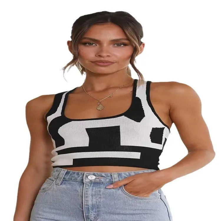 Women's slim fit U-neck camisole in polyester fabric, shown in a contrast colour.