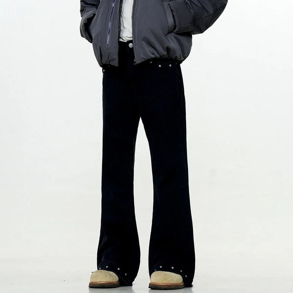 Straight-leg cotton jeans on a hanger, showing mid-waist fit, zipper fly, and horn-style leg opening.