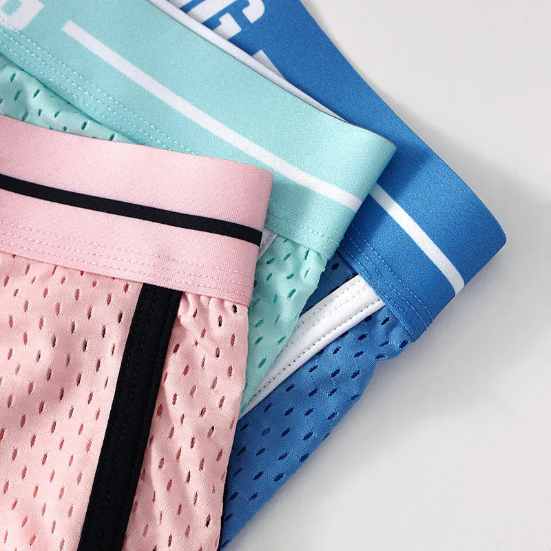 Men's loose thin boxer shorts in a solid colour, made from knitted Ice Silk and nylon fabric.