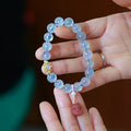 Aquamarine Chinese Fengjiu style bracelet with fox design and pink crystal accents for women