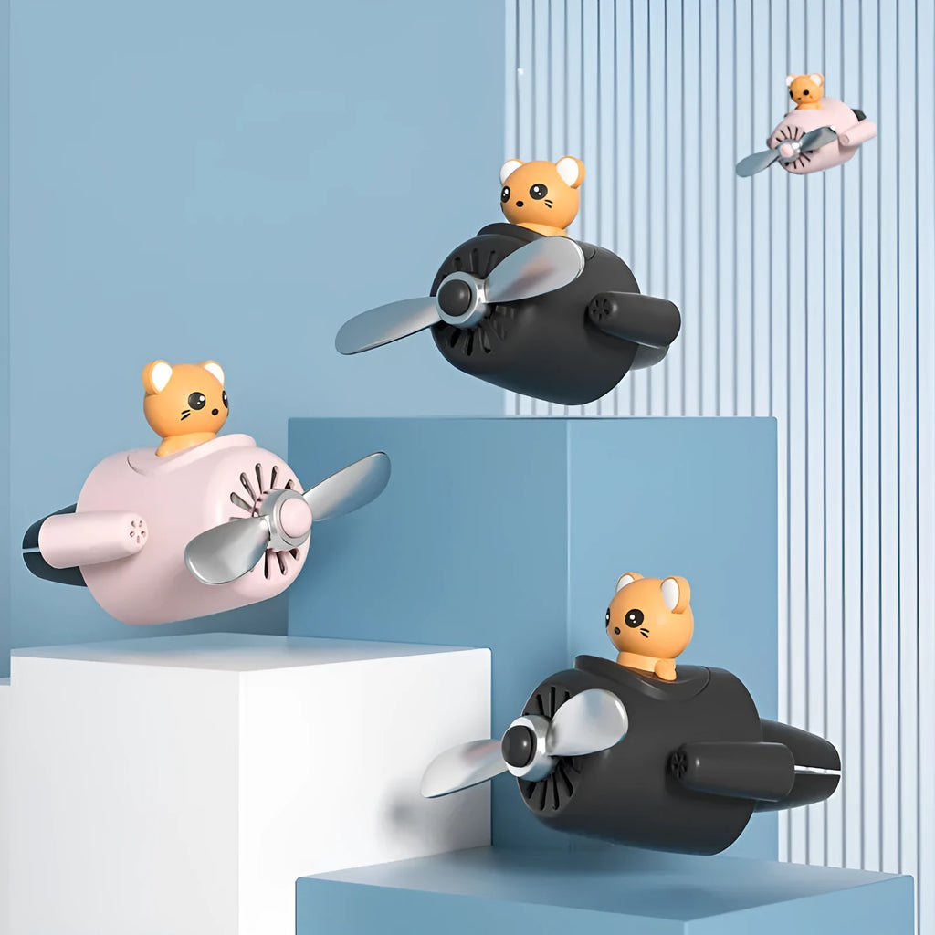 Cartoon-style small plastic airplane car air vent aromatherapy diffuser.