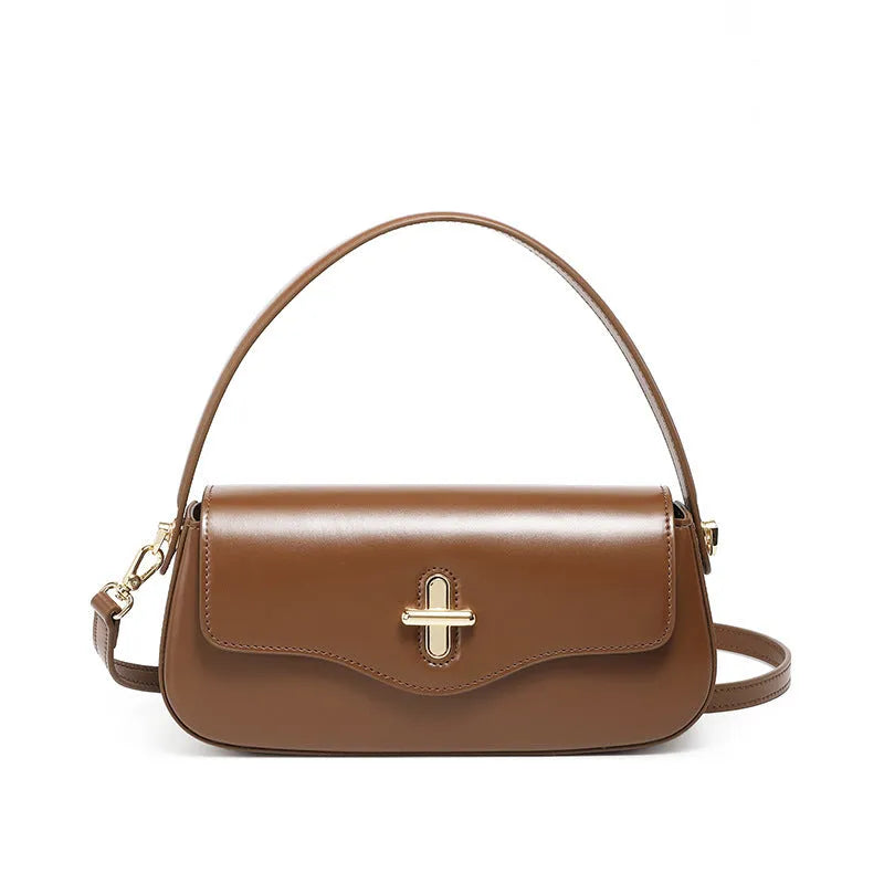 Genuine leather baguette handbag in horizontal square clamshell design, shown in black colour