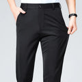Men's loose fit casual business trousers in black, high elasticity polyester, side view