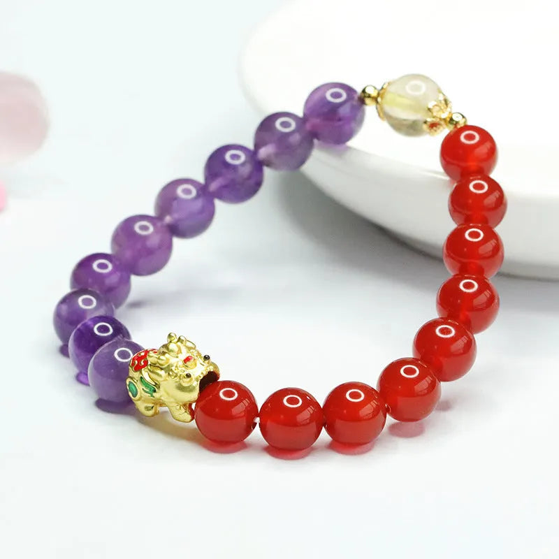 Close-up of an amethyst and red agate beaded bracelet in Chinese style with 8mm stone beads.