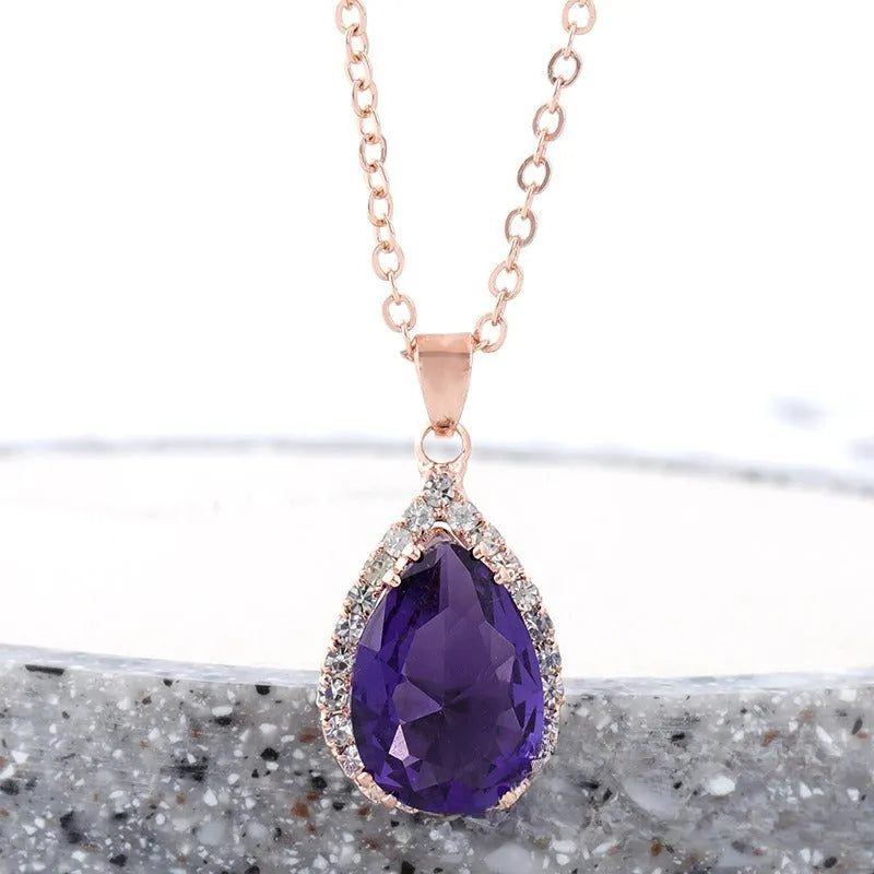 Geometric rhinestone water drop necklace in rose gold electroplated finish