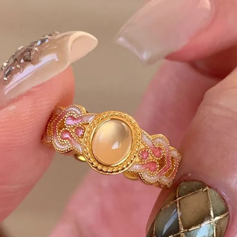 Geometric open band women's ring with pink crystal enamel on copper gold plating, colour K227.