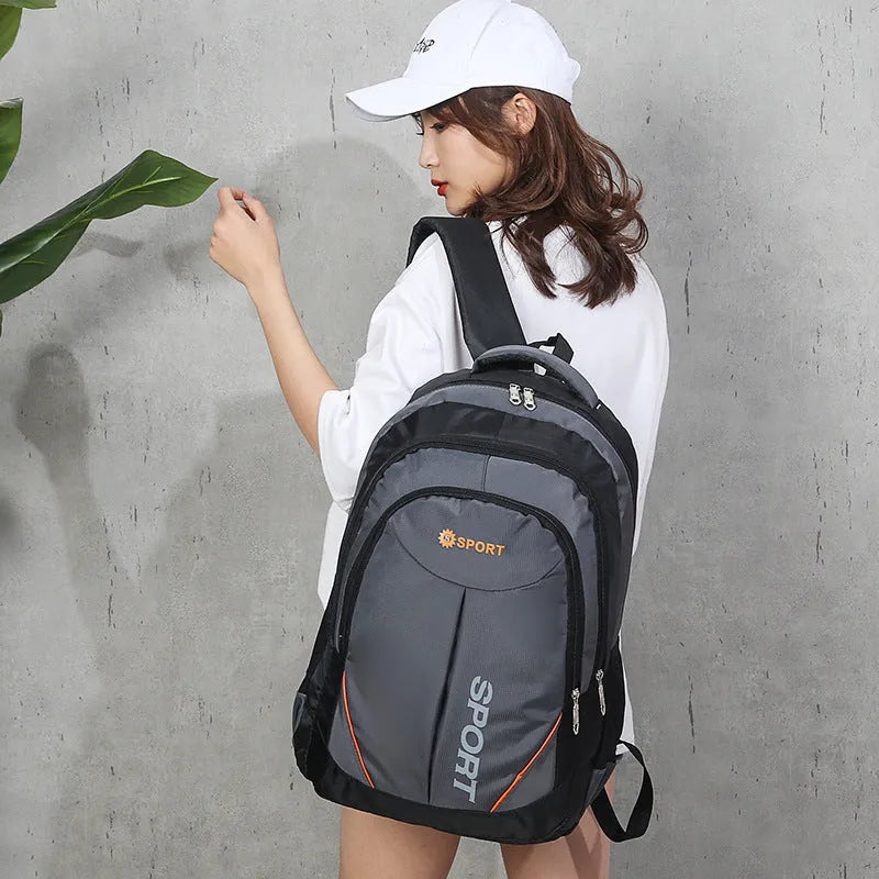Large nylon backpack for men in grey colour with letter detailing and curved shoulder straps