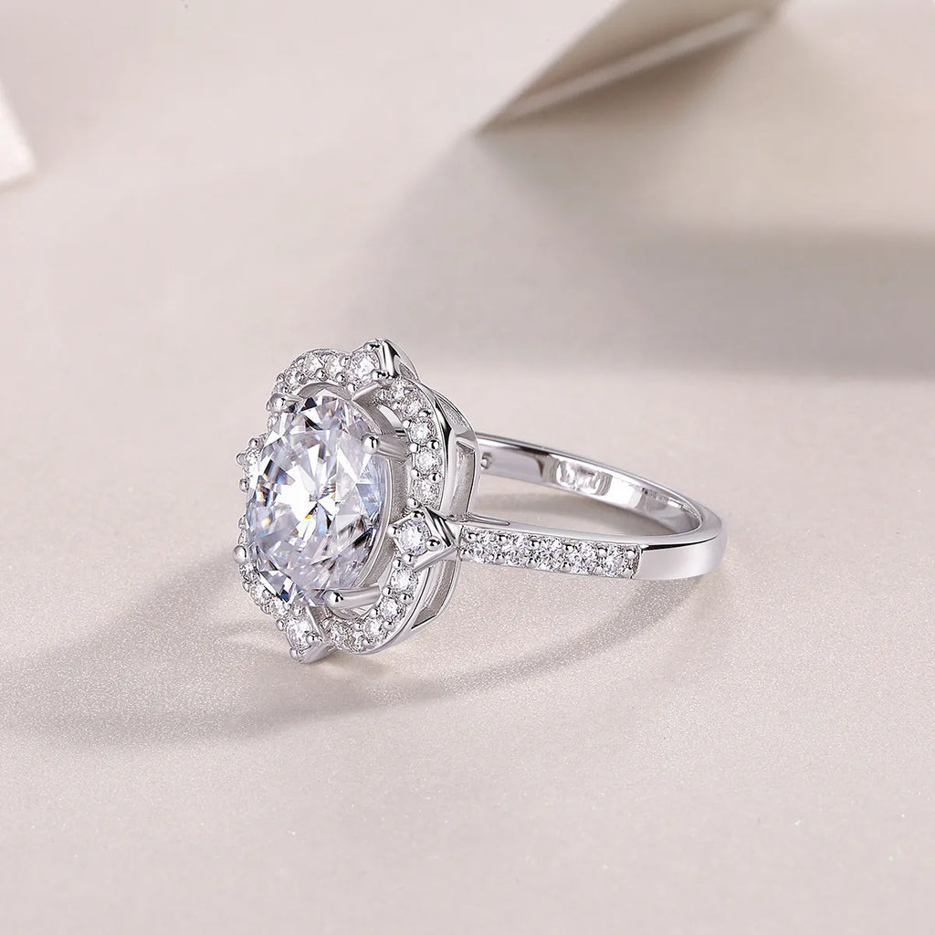 Camellia moissanite wedding ring set with egg-shaped 8x10mm stone, platinum-plated S925 silver band, gift box packaging