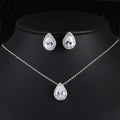 Women's water drop gemstone necklace and earrings set in copper with zircon on white background