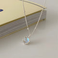 Silver 925 ornamental necklace with round geometric pendant on a curb chain, adjustable length.