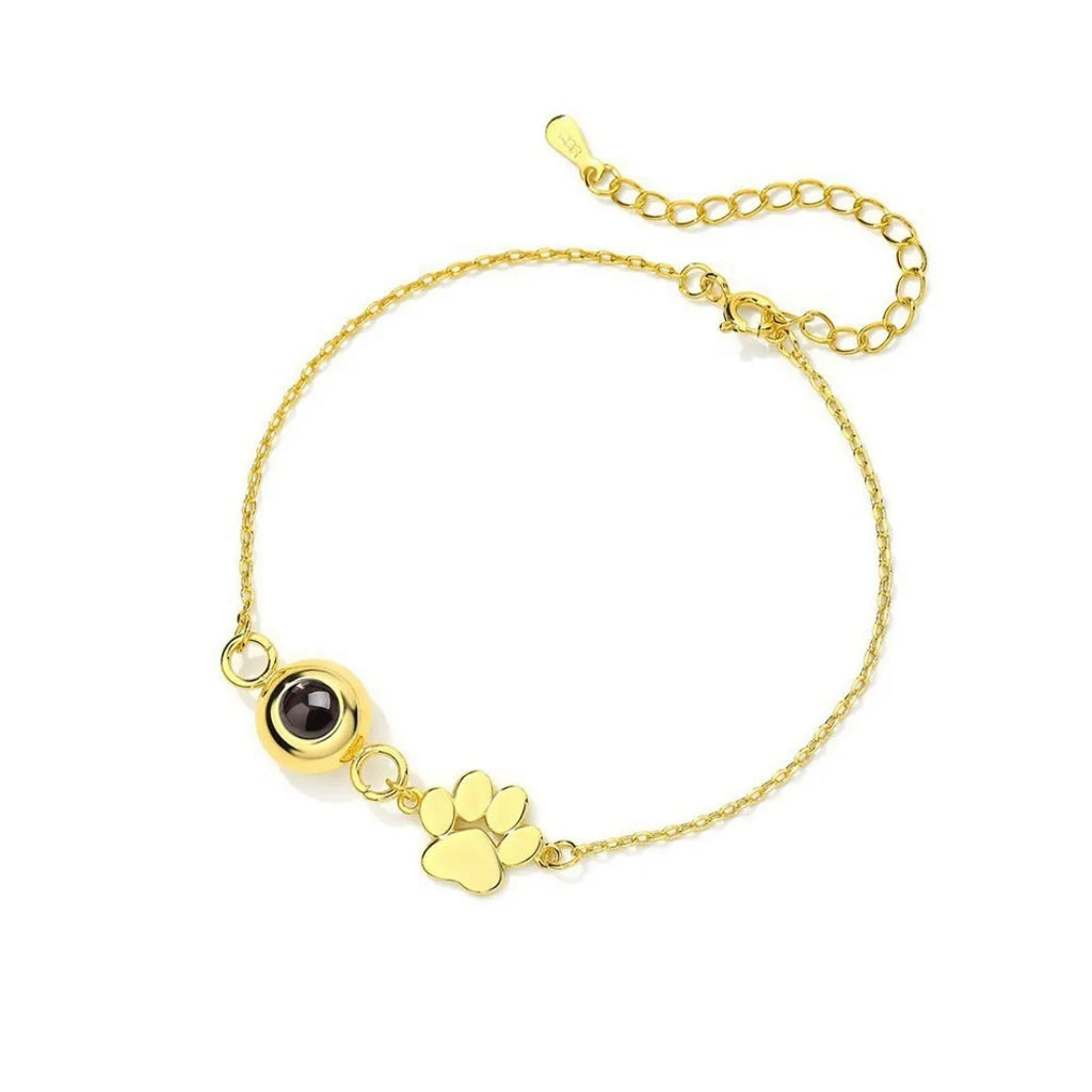 Titanium steel pet paw print cuff bracelet with chain and cat claw elements in gold finish