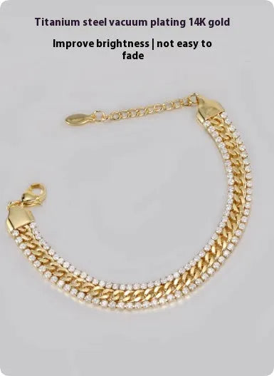 Gold tennis bracelet with artificial gemstone inlay on titanium steel band
