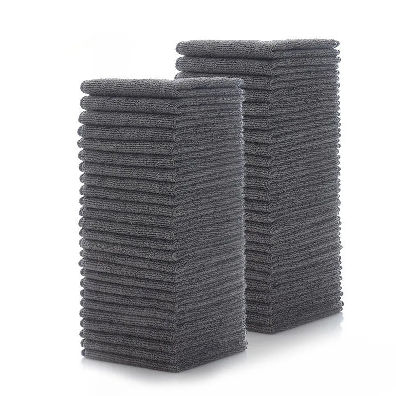 Grey square microfiber kitchen cleaning cloth for oilproof, lint-free drying of pots and bowls.