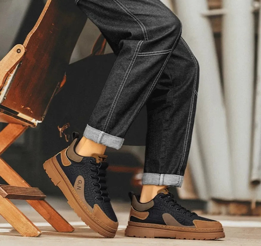 Black and white platform sneakers with thick rubber sole and microfiber leather insole.