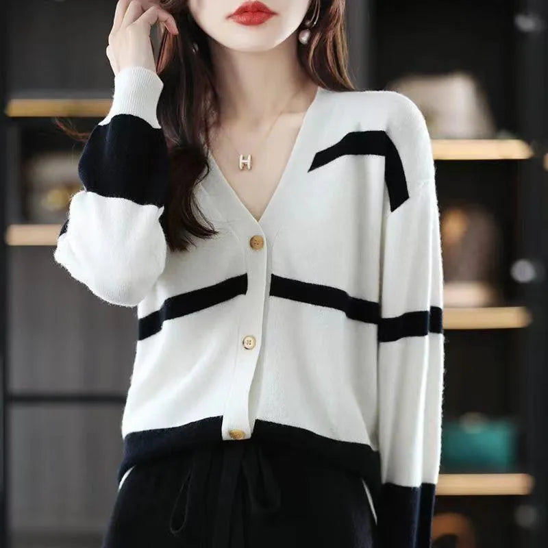 Women's V-neck knitted cardigan with 3D striped pattern in slim fit showing colour options