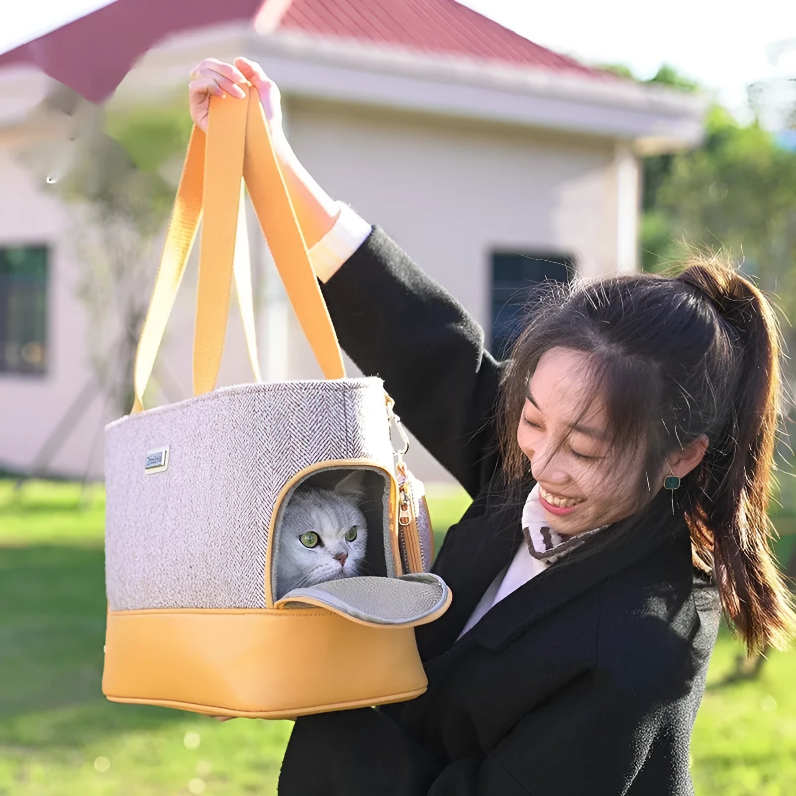 Capsule-shaped pet backpack with mesh windows in beige brown colour