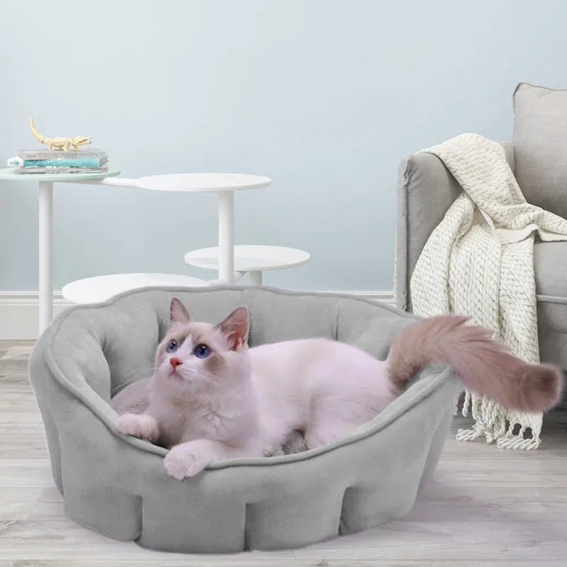 Grey plush cat kennel with an integrated hammock, showing soft interior and dimensions of 46cm wide.