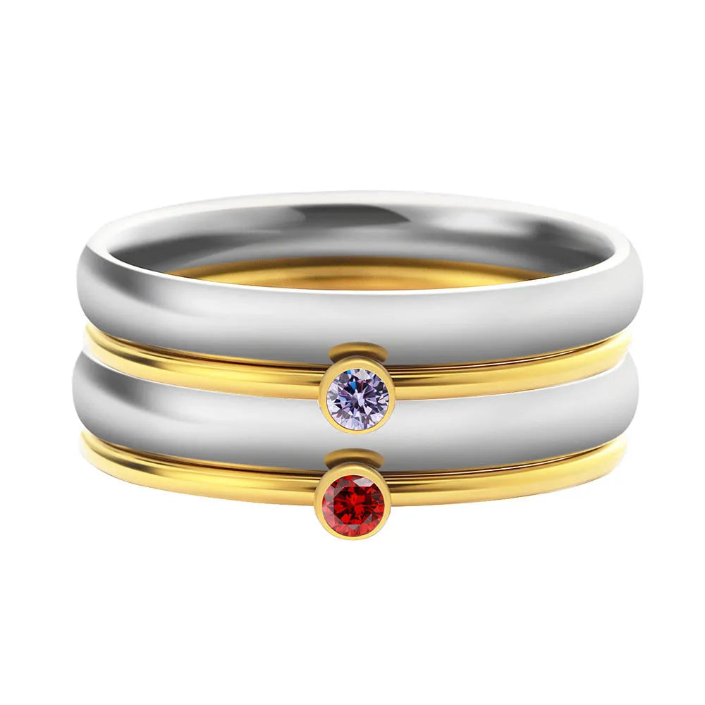 December colour birthstone ring with geometric engraving on a gold electroplated titanium steel band.