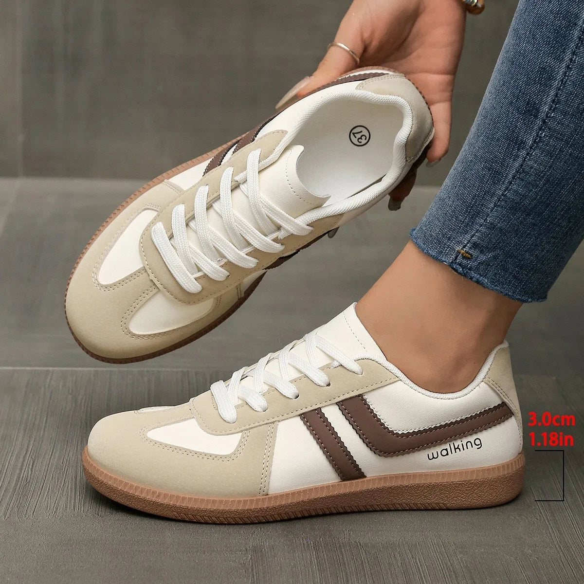 Retro low top training sneakers in multiple colours with a round toe and flat rubber sole.