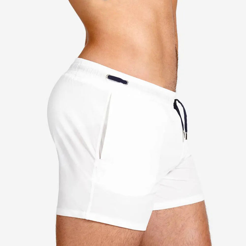 Men's mesh lining sports shorts in polyester available in multiple colours